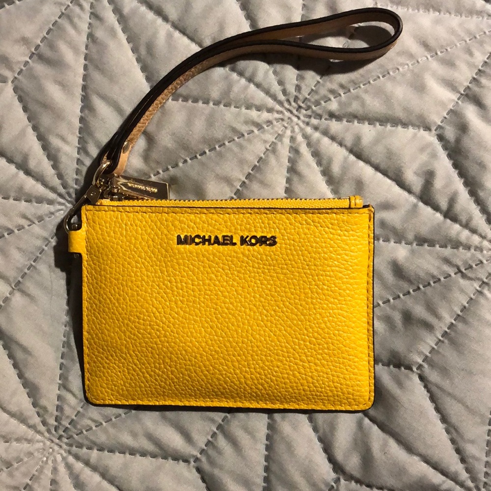 Yellow and tan MK wristlet